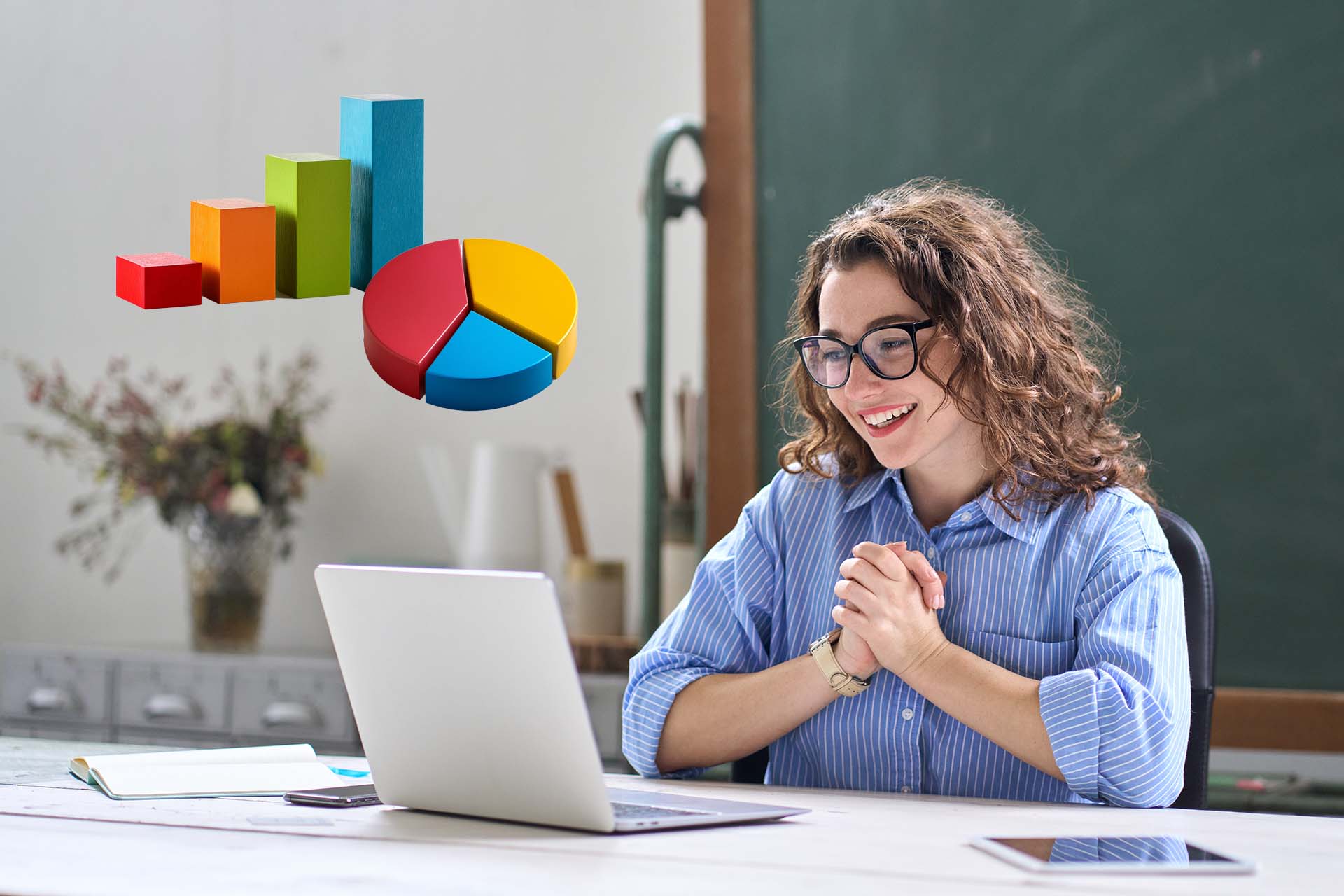  A bespectacled female teacher at the computer